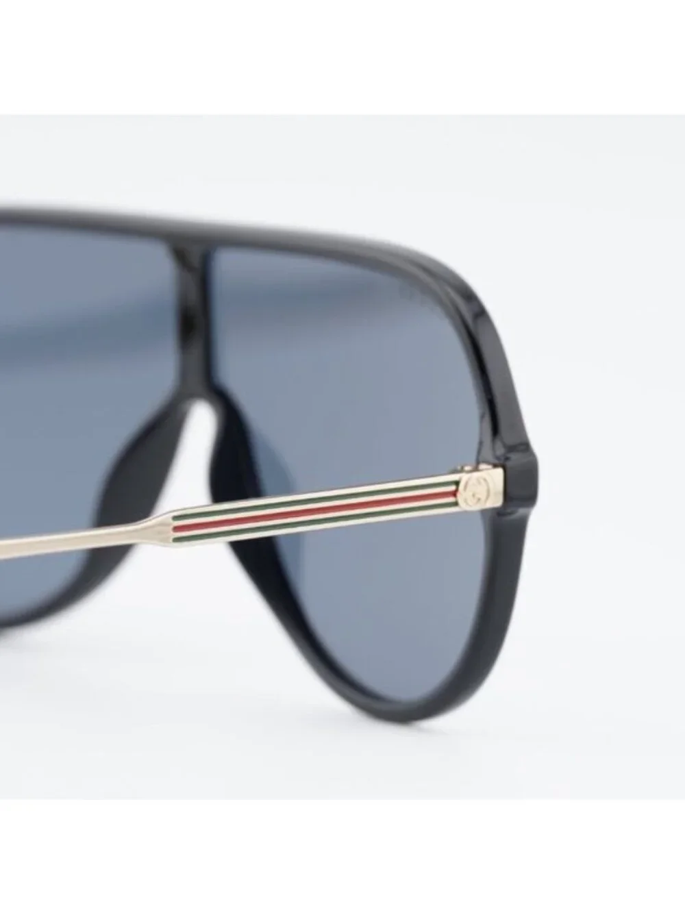 Gucci GG0199S 001 Sunglasses Shiny Black/Gold Shield Frame, Grey Lenses